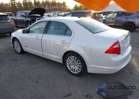 2011 Ford Fusion Hybrid из США, поврежденный, VIN 3FADP0L39BR301457